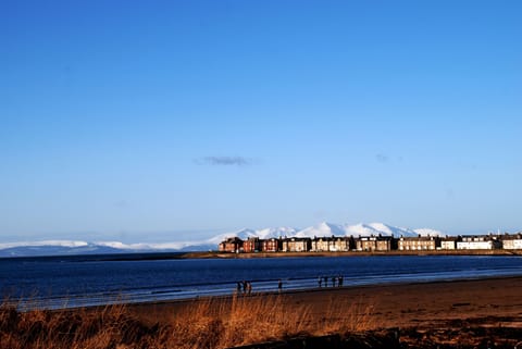 On the beach, sun loungers, beach towels