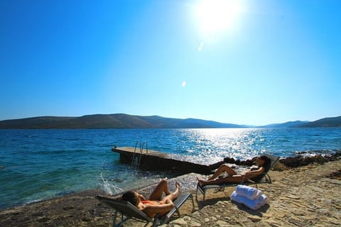 Beach nearby, sun loungers