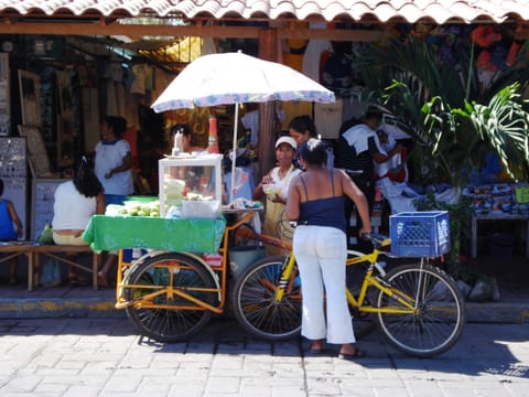 Many sidewalk vendors in town. Fresh fruits, juices & coconuts.