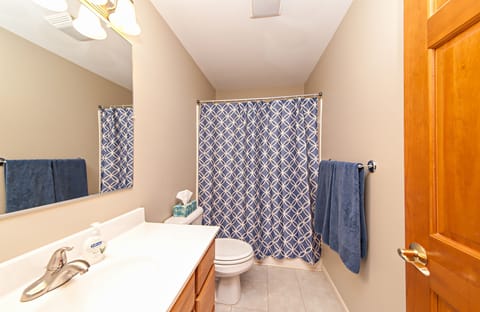 Combined shower/tub, hair dryer, towels, soap