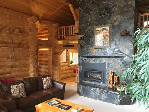 Upon entering the lodge, the living room opens up with huge lofted ceilings