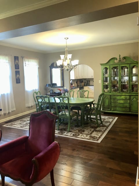 Dinning room, & china cabinet with plenty  of glassware and dishes.