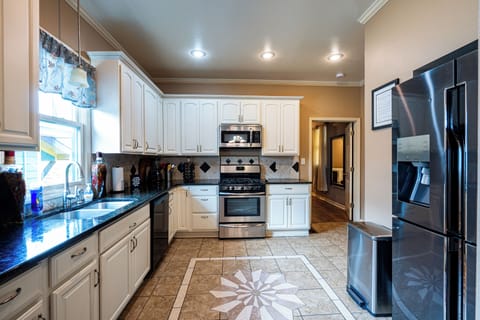 Kitchen equipped with all stainlees steel apliances.