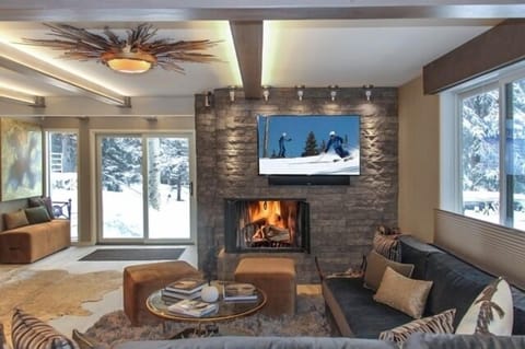 Living area | Smart TV, fireplace, books, music library