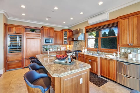 Grand bar, Sub Zero refrigerator, wine cooler, ice machine and 2 dishwashers