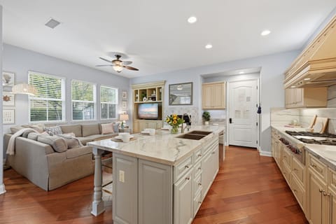 Fully stocked kitchen and adjacent cozy family room - the heart of our home