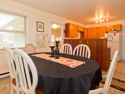 Dining Area, seats 6+, off of fully stocked kitchen with stove and refrigerator