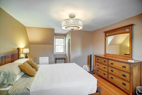 Larger Upstairs Bedroom with Caged Ceiling Fan 