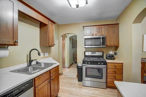 Kitchen with Gas Stove, Microwave, and Toaster