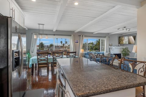 Open kitchen to dining room and living room, ocean views everywhere