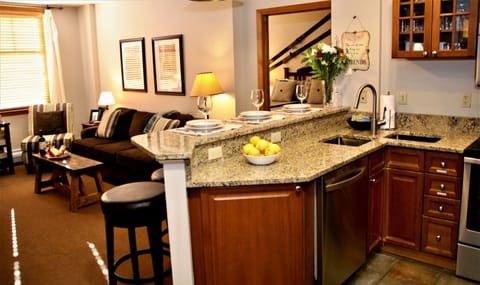 Zephyr ski-in/ski-out condo with fully equipped kitchen with granite countertops