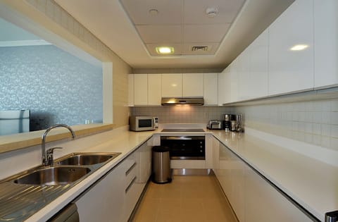 "Prepare a meal in the fully-equipped kitchen , everything a family might need"