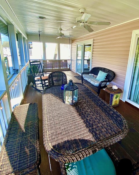 Back Porch with swing and picnic table
