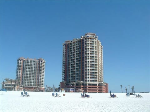 On the beach, sun loungers, beach towels