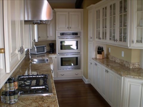 Beautiful designer kitchen with stainless appliances