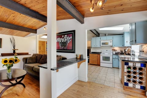Living room and fully stocked kitchen