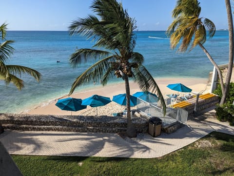 On the beach, sun loungers, beach towels