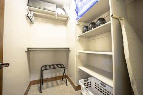 Double queen closet.  Pack n play and 2 booster seats for dining.