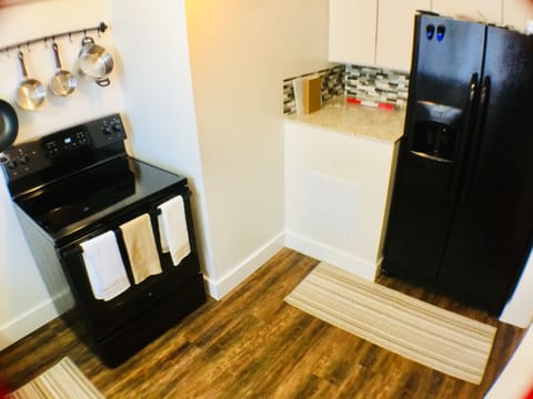 Full Kitchen with full size Fridge/freezer and stove