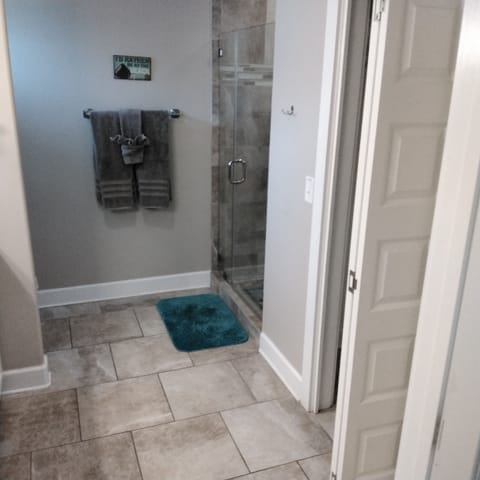 Combined shower/tub, hair dryer, towels, soap