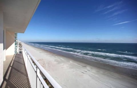 On the beach, sun loungers, beach towels