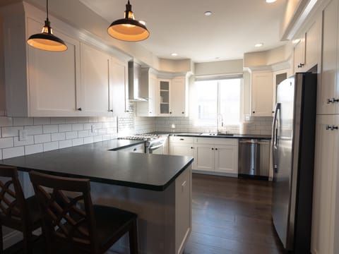 Stainless appliances, Beautiful Honed Granite Counter, and lots of Cabinets