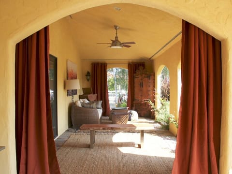 Private loggia with daybed located off of the front Master bedroom