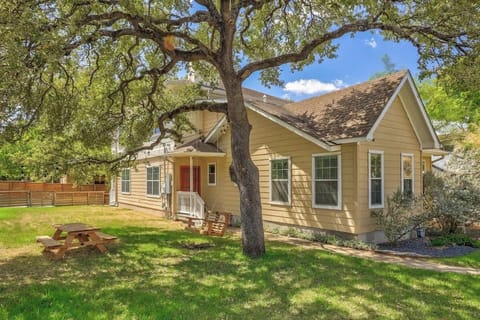 Swing under the gorgeous tree in the spacious backyard