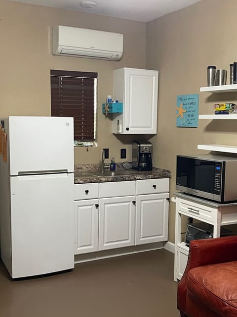 Fridge, microwave, coffee/tea maker, toaster