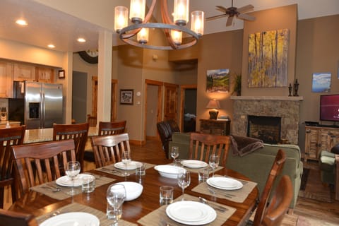 Open concept with high ceilings make this dining space roomy and comfortable