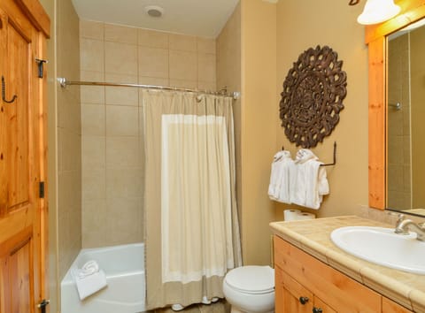 Second full bath directly accessible from 2nd bedroom and main living area
