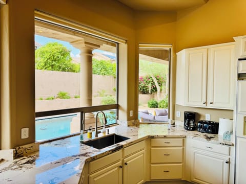 Kitchen overlooking pool