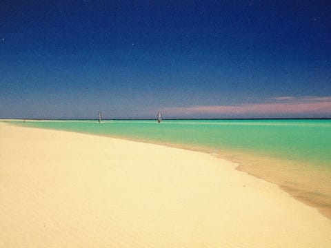 Beach nearby, sun loungers