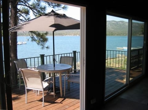 Living Room lake views are clearly seen through dual-paned Milgard windows