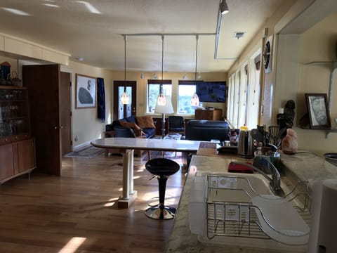 View from kitchen through living room, open concept