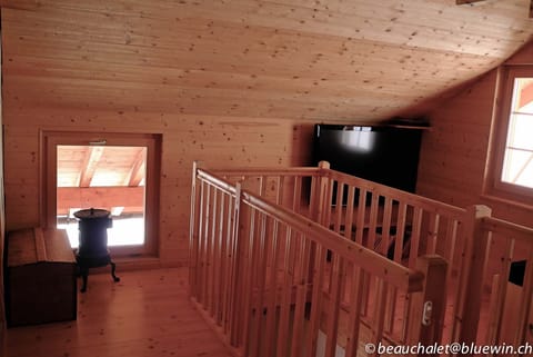 First floor, stairwell and TV corner.