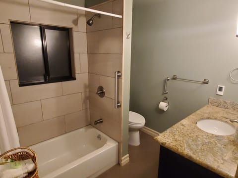 Combined shower/tub, hair dryer, towels, soap