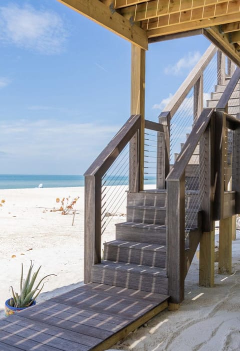 On the beach, sun loungers, beach umbrellas, beach towels