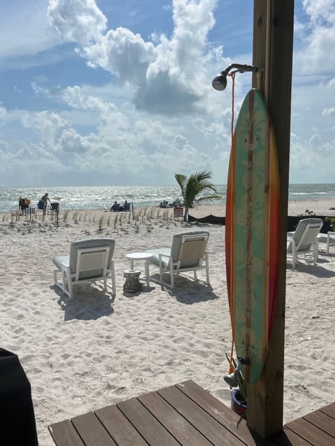 On the beach, sun loungers, beach umbrellas, beach towels