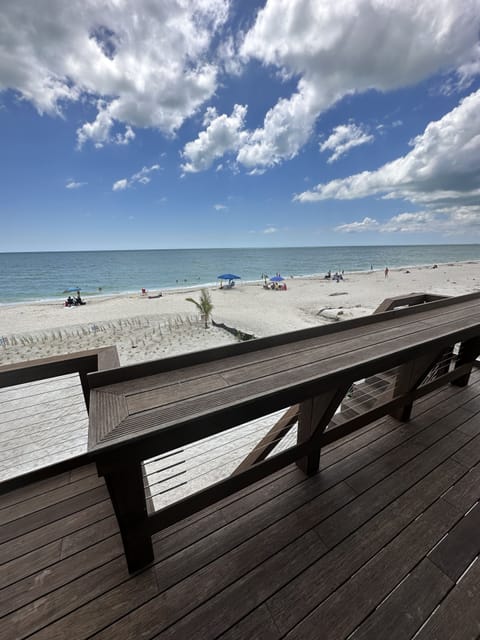 On the beach, sun loungers, beach umbrellas, beach towels