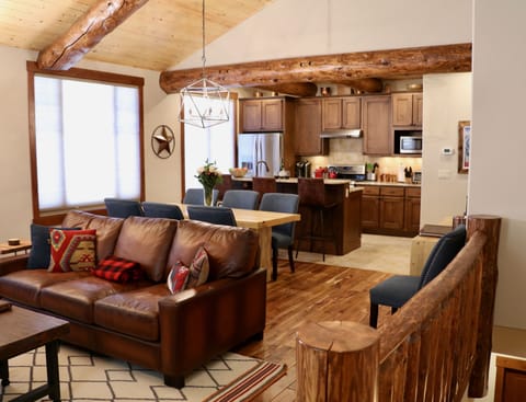 Fully equipped kitchen with granite countertops & stainless steel appliances