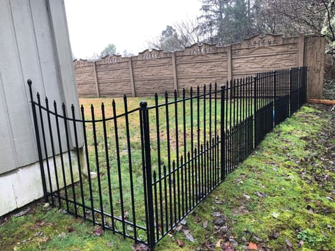 Corner gate panel for dog entering backyard