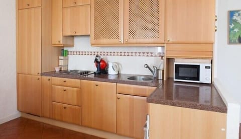 Open kitchen with all ameneties (including dish washer, oven and microwave oven)