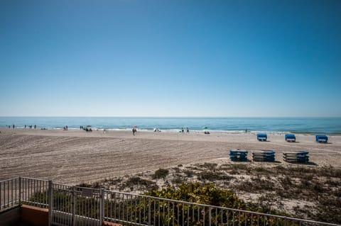 On the beach, sun loungers, beach towels