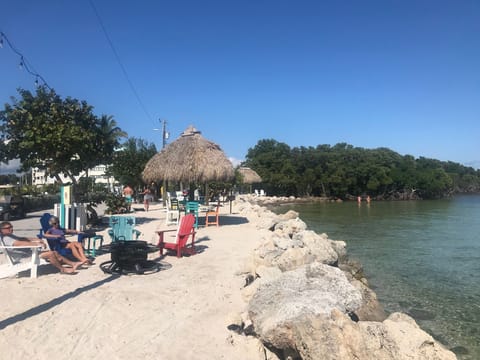 On the beach, sun loungers, beach towels