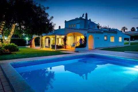 Outdoor pool, a heated pool, sun loungers