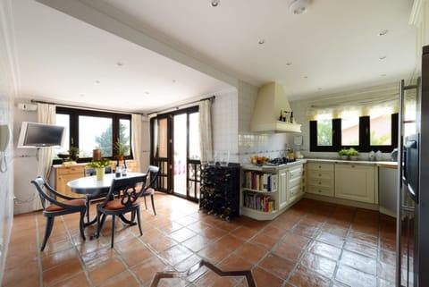 Kitchen with outside terrace.
