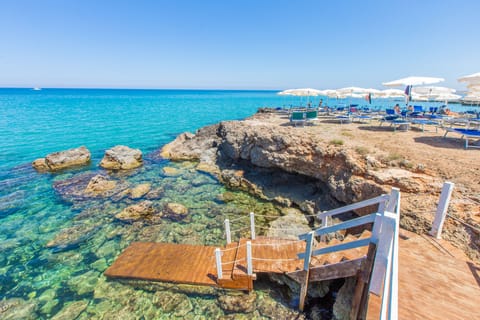 On the beach, sun loungers