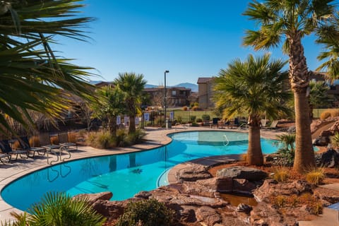 A heated pool, pool umbrellas