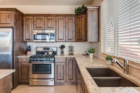 Fully stocked with appliances and utensils for cooking